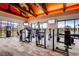 Well-equipped fitness center with various strength training machines and mirrored walls at 10663 Sariah Skye Ave, Las Vegas, NV 89166