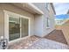 Paver patio with sliding glass door access and view of backyard area at 10663 Sariah Skye Ave, Las Vegas, NV 89166