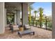 Outdoor patio featuring ample seating, lounge chairs, landscaping, and a community pool nearby at 11315 Gravitation Dr, Las Vegas, NV 89135