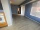 Open concept living room offers ample space for entertaining and relaxing, with natural light at 15 E Agate Ave # 202, Las Vegas, NV 89123