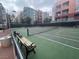 Enjoy a sunny day on this outdoor tennis court, surrounded by lush landscaping and benches at 15 E Agate Ave # 202, Las Vegas, NV 89123