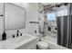 Elegant bathroom with marble tiling, a shower-tub combo, and modern fixtures at 1660 Izabella Ave, Las Vegas, NV 89169