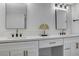 Stylish bathroom vanity with double sinks and gold fixtures, creating a luxurious feel at 1660 Izabella Ave, Las Vegas, NV 89169