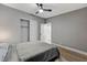 Bright bedroom featuring ample closet space and access to a bathroom at 1660 Izabella Ave, Las Vegas, NV 89169