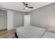 Spacious bedroom featuring a closet with sliding doors and wood-look flooring at 1660 Izabella Ave, Las Vegas, NV 89169