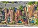 Aerial view of a luxurious property with a terracotta roof, landscaped yard, and inviting swimming pool at 1795 Anelli Ct, Henderson, NV 89012