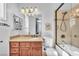 Bathroom featuring a vanity, a shower/tub combo, and a stylish light fixture at 1795 Anelli Ct, Henderson, NV 89012