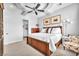 Inviting bedroom featuring an artistic ceiling design, cool colors, and plush furnishings at 1795 Anelli Ct, Henderson, NV 89012