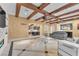 Spacious living room featuring wood beam ceilings and stylish decor at 1795 Anelli Ct, Henderson, NV 89012