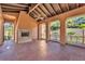 Expansive outdoor patio area featuring a fireplace, high ceilings, and panoramic views at 1795 Anelli Ct, Henderson, NV 89012