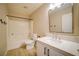 Bright bathroom features a tub-shower combo and a modern vanity with white countertops and black hardware at 189 Kings Canyon Court Ct, Henderson, NV 89012