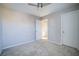 Light and airy bedroom featuring neutral walls and carpet at 189 Kings Canyon Court Ct, Henderson, NV 89012