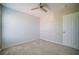 Bright bedroom with ceiling fan and painted brick accent wall at 189 Kings Canyon Court Ct, Henderson, NV 89012