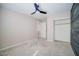 Neutral bedroom featuring a ceiling fan and spacious closet at 189 Kings Canyon Court Ct, Henderson, NV 89012
