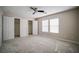 Cozy bedroom with carpet and ample closet space with modern ceiling fan at 189 Kings Canyon Court Ct, Henderson, NV 89012