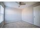 Bright bedroom featuring a window and a painted brick accent wall at 189 Kings Canyon Court Ct, Henderson, NV 89012