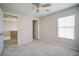 Bright bedroom featuring a window and neutral colored walls at 189 Kings Canyon Court Ct, Henderson, NV 89012