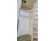 Walk-in closet featuring white walls, carpeted floor and multiple shelves at 189 Kings Canyon Court Ct, Henderson, NV 89012