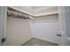 Walk-in closet with organized hanging space and neutral carpet at 189 Kings Canyon Court Ct, Henderson, NV 89012