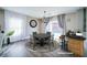 Cozy dining area with modern chandelier, seating for four, and bar area at 189 Kings Canyon Court Ct, Henderson, NV 89012
