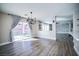Dining area with a chandelier and sliding glass doors to the backyard at 189 Kings Canyon Court Ct, Henderson, NV 89012