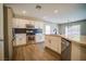 Modern kitchen features stainless steel appliances, white cabinetry, and stylish backsplash at 189 Kings Canyon Court Ct, Henderson, NV 89012