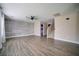 Bright living room with an accent wall and hardwood floors at 189 Kings Canyon Court Ct, Henderson, NV 89012