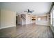 Open living space with wood floors and stairs leading to the upper level at 189 Kings Canyon Court Ct, Henderson, NV 89012