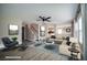 Staged living area featuring wood floors, sofa, and stairs at 189 Kings Canyon Court Ct, Henderson, NV 89012
