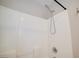 The shower features a white tile surround and a chrome shower head at 189 Kings Canyon Court Ct, Henderson, NV 89012