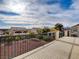Large upper deck overlooking landscaped backyard at 209 Tainted Berry Ave, North Las Vegas, NV 89031