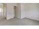 Bedroom features neutral walls, plush carpet, and large closet for added storage space at 209 Tainted Berry Ave, North Las Vegas, NV 89031