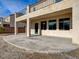 Covered outdoor patio for entertaining, complete with a concrete foundation and stucco columns at 209 Tainted Berry Ave, North Las Vegas, NV 89031