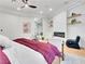 Cozy main bedroom with a fireplace, floating shelves, and modern decor at 211 Granite Ct, Boulder City, NV 89005