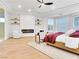 Spacious main bedroom with a fireplace, tray ceilings, and modern decor at 211 Granite Ct, Boulder City, NV 89005