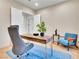 Inviting office space with a modern desk, stylish chair, and a comfortable seating area at 211 Granite Ct, Boulder City, NV 89005