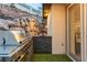 Outdoor kitchen featuring stainless steel grill, stone backsplash, and views of the backyard at 211 Granite Ct, Boulder City, NV 89005