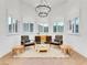 Cozy sitting area with natural light, elegant furnishings, and stylish window treatments at 211 Granite Ct, Boulder City, NV 89005