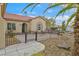 Beautiful single-story home with a well-designed landscape, wrought iron fence and desert landscaping at 2429 Wisconsin Dells Dr, Henderson, NV 89044