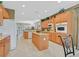 Spacious kitchen with wood cabinets, granite counters, and modern appliances at 2429 Wisconsin Dells Dr, Henderson, NV 89044