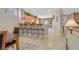 Open kitchen featuring breakfast bar seating and tile floors at 2429 Wisconsin Dells Dr, Henderson, NV 89044
