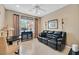 Living room with comfortable leather seating and natural light at 2429 Wisconsin Dells Dr, Henderson, NV 89044
