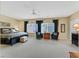 Spacious main bedroom featuring a ceiling fan, neutral carpet, and plenty of natural light at 2429 Wisconsin Dells Dr, Henderson, NV 89044