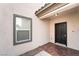 Inviting front entrance with tile flooring and stylish black front door at 2482 Denholme St, Henderson, NV 89044