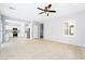 Open-concept living area with a kitchen featuring stainless appliances at 2482 Denholme St, Henderson, NV 89044