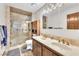 Bathroom featuring a double vanity, and glass enclosed shower at 2583 Egret Cir, Las Vegas, NV 89121