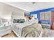 Stylish bedroom featuring a bright blue accent wall, with carpeted floors at 2583 Egret Cir, Las Vegas, NV 89121