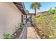 Inviting front entryway with decorative details, a charming window, and desert landscaping at 2583 Egret Cir, Las Vegas, NV 89121
