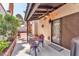 Covered patio features seating, ceiling fan, and access to backyard at 2583 Egret Cir, Las Vegas, NV 89121
