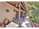 Covered patio with ceiling fan, outdoor furniture, and access to backyard at 2583 Egret Cir, Las Vegas, NV 89121